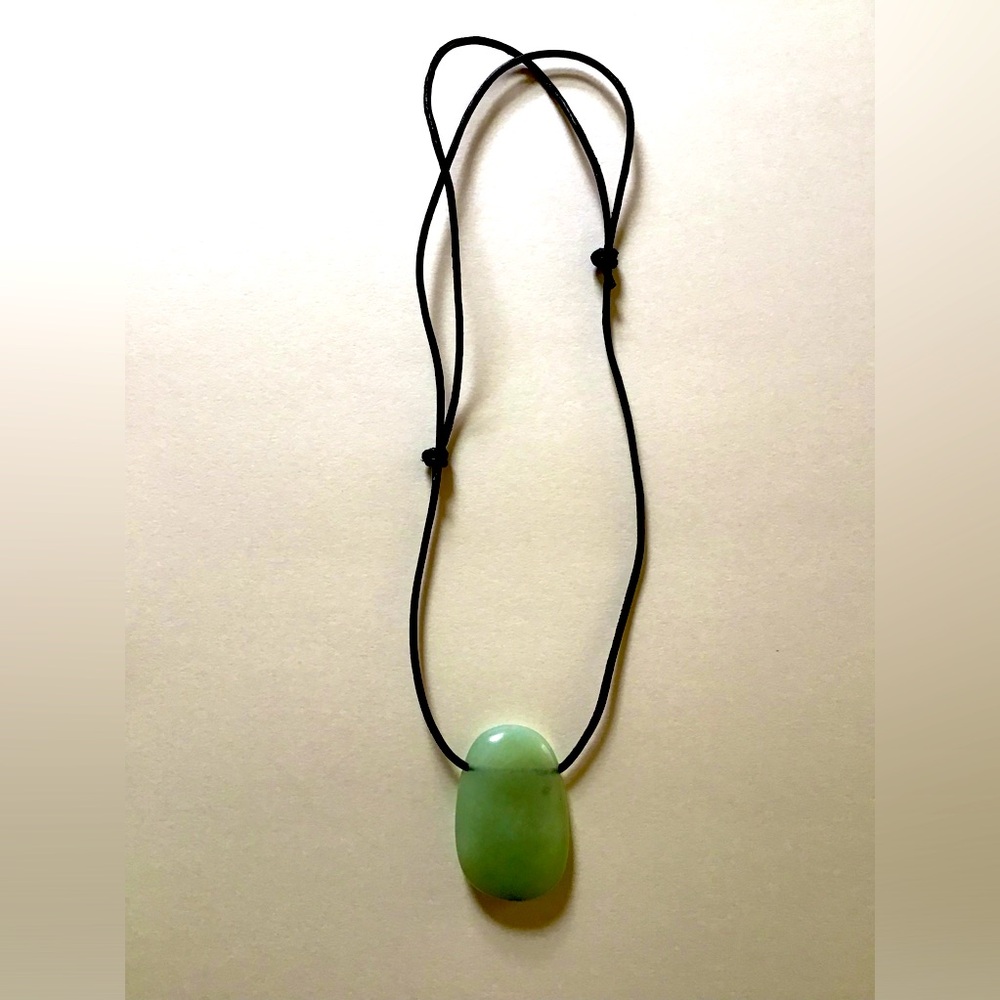 Real Chinese jade necklace with adjustable string.